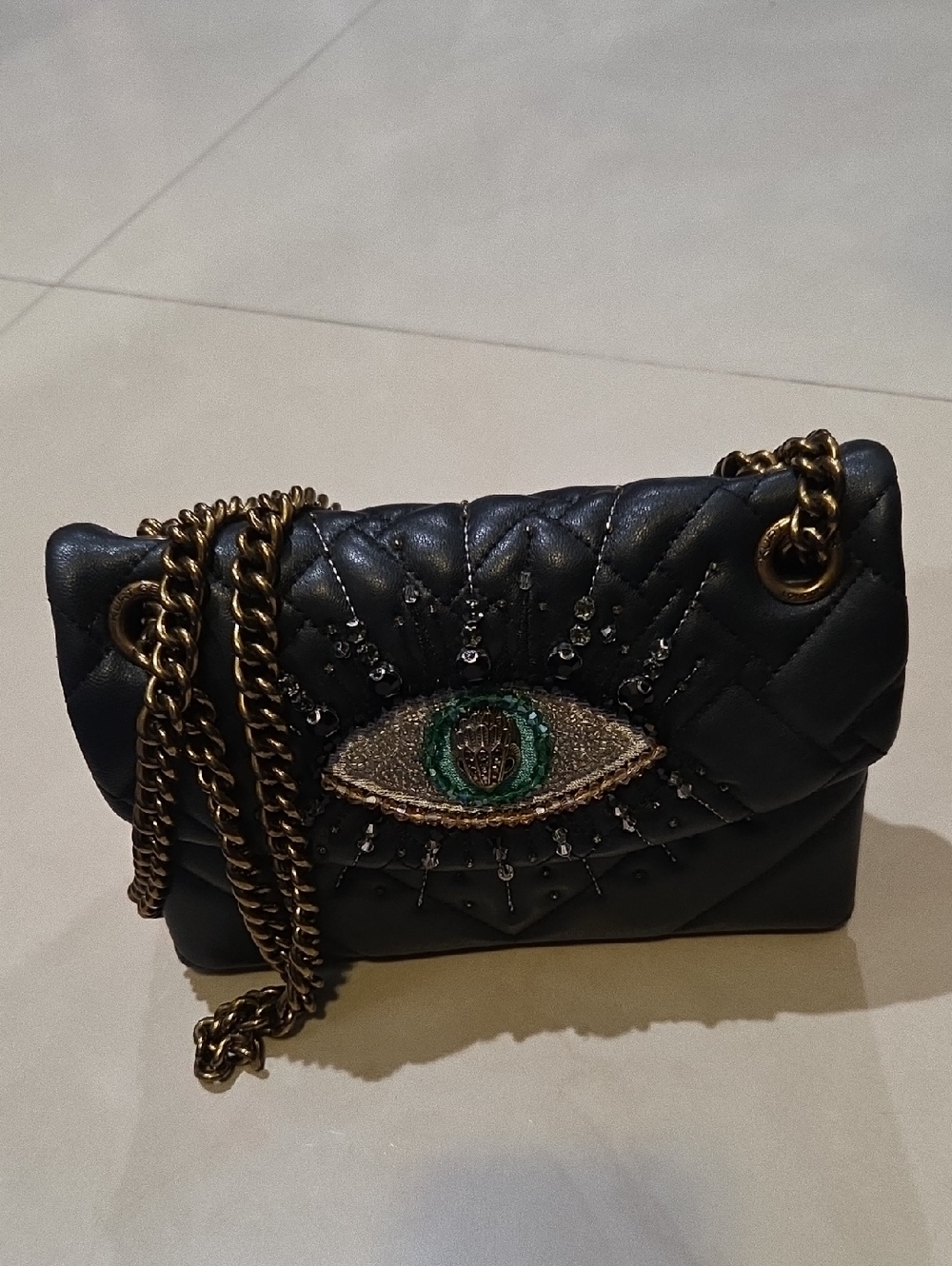 Kurt Geiger Black Quilted Crossbody with Eye Embellishment
